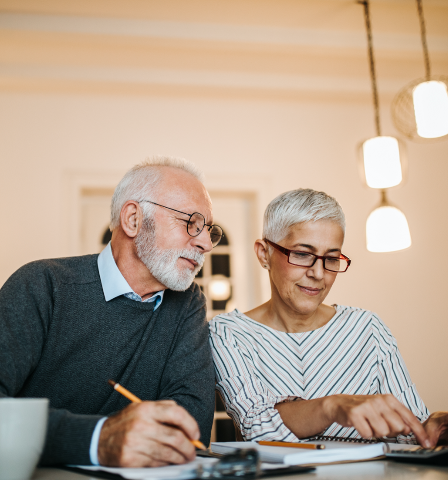 older couple working on taxes